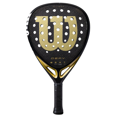 A black and gold Wilson Defy V1 padel racket with a diamond-shaped head and a patterned grip.