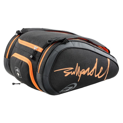 Black and orange bag with a signature on a white background